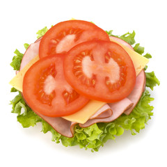 Healthy open sandwich with lettuce, tomato, smoked ham and chees