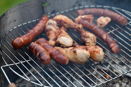 barbecue with delicious grilled meat on grill