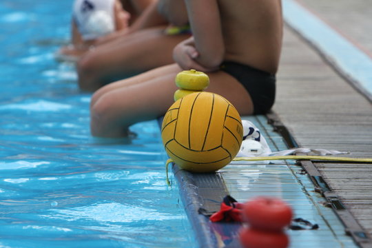 water polo game in swimming pool