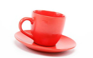 cup and saucer are on white