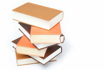 A stack of books on a white background.