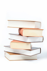 A stack of books on a white background.