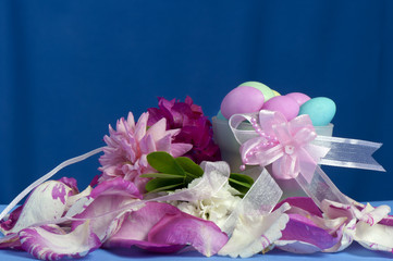 Arrangement with flowers and candy boxes