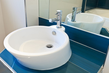 Fototapeta premium interior bathroom in modern house, sink and mirror