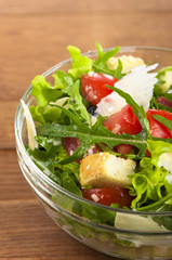 italian salad from tomatoes, rucola, grated parmesan cheese
