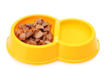 yellow bowl with cat food and water isolated on white
