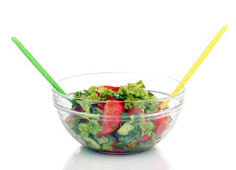 Fresh salad with tomatoes and cucumbers isolated on white