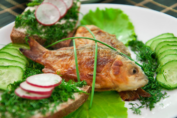 Fried carp with vegetables