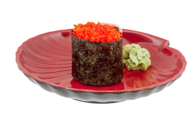 Sushi with fying fish caviar isolated over white background