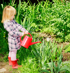 Girl with watering can © Dmitry Naumov