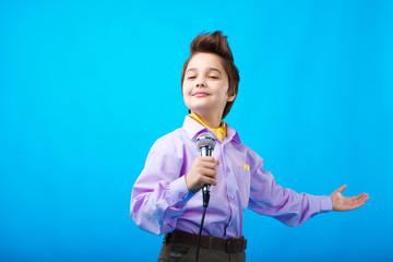 a boy with microphone