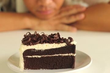 The man and  chocolate cake