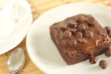 chocolate cake and  spoon