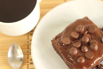 Chocolate cake a cup of coffee