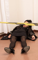 Killed victim lying on the floor (imitation)