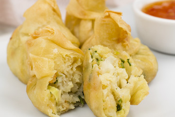 Shrimp Wonton: Close up of fried wontons with sweet chilli sauce