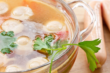 Vegetable soup with sausages