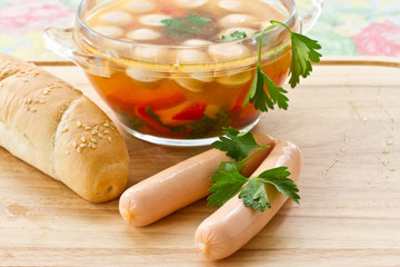 Vegetable soup with sausages