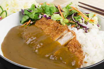 Katsu Kare served with salad, steamed rice and curry sauce.