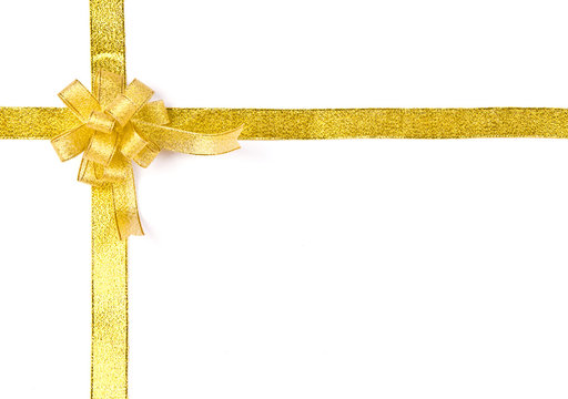 Gold ribbon with bow on white background