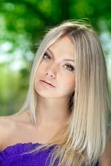 Portrait of a girl with blond hair and brown eyes