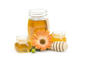 honey and flower on white