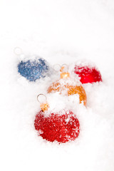 Blue ,red and gold christmas balls with snow
