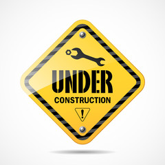 Obraz premium Under construction sign black and yellow, vector