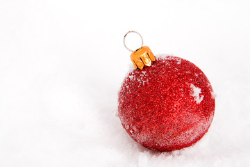 Blue ,red and gold christmas balls with snow