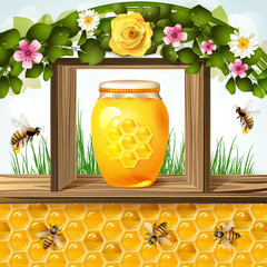 Glass jar and honey over floral background