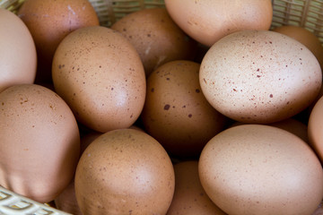 Brown eggs in a Wicker basket