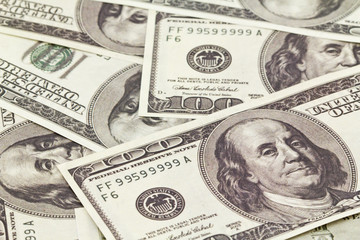 close up image of pistol and dollar