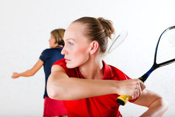 Squash racket sport in gym