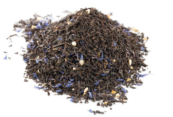 Lady Grey black loose tea leaves on white background, shallow do