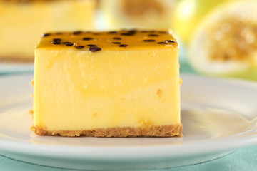 Fresh passion fruit cheesecake dessert on plate