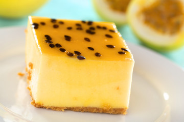 Fresh passion fruit cheesecake dessert on plate