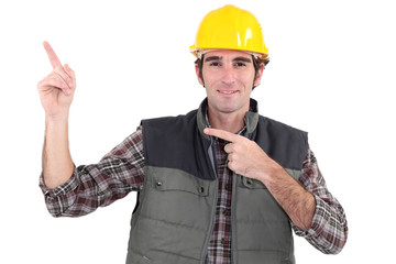 Construction worker pointing