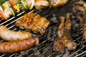 Closeup of fried meat on grill