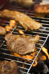 Meat on grill in fire!