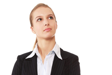 A young successful businesswoman looking up