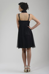 Fototapeta premium elegant woman in fashionable dress posing in the studio