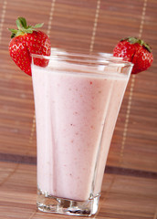 Smoothie strawberry served with fresh strawberry