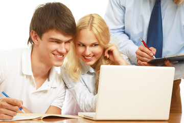 Businesspeople working together at table