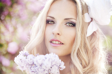 Fototapeta premium beautiful girl in a lavender garden