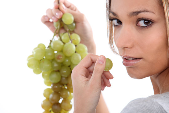 Woman Eating Grapes