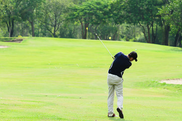 Golfer hitting a driver from the tee-box
