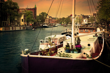 Fototapeta premium Amsterdam. Romantic canal, boats.