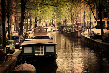 Naklejka premium Amsterdam. Romantic canal, boats.