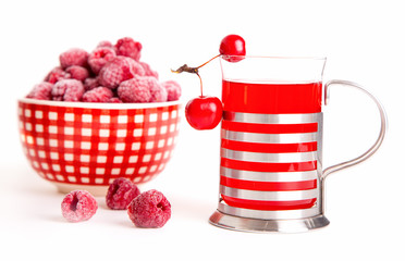 glass juice with chinese cherry apples and frozen raspberries,