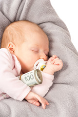 Little child holding polish money